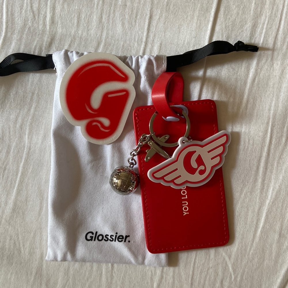 GLOSSIER D.C. Luggage Tag